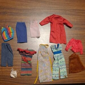 Vintage Doll Fashion Set with Red, Blue, and Multicolor Outfits